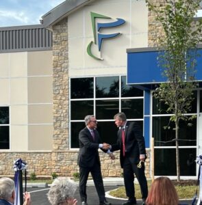 Frederick Health Thurmont Immediate Care Ribbon Cutting shaking hands